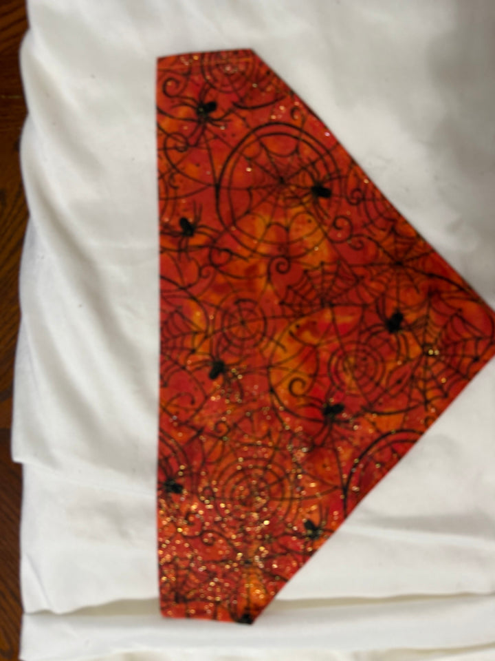Halloween floral swirl pet bandanna in red and orange batik with sparkle accents